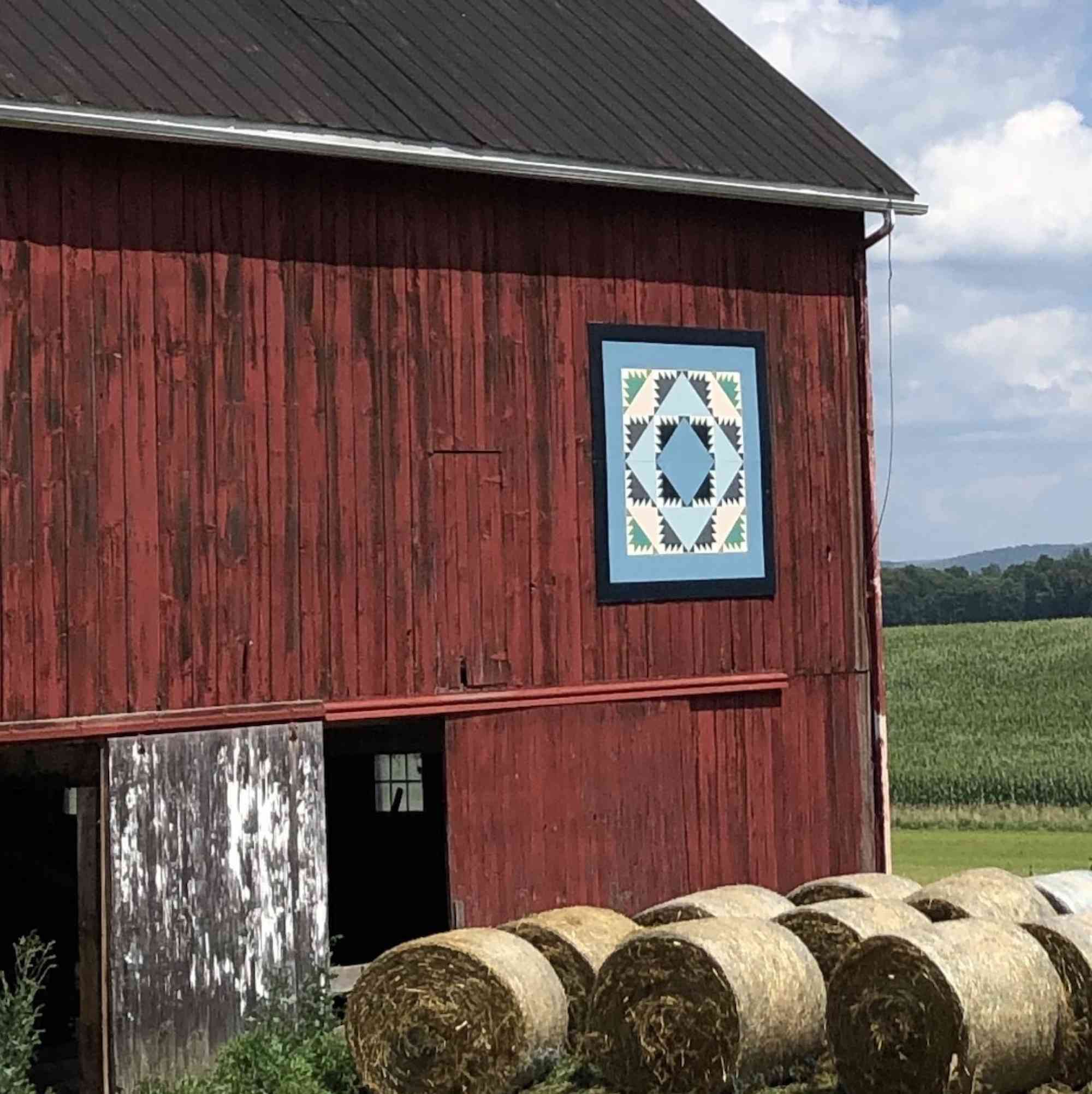 Rhoneymeade red barn hay quilt square