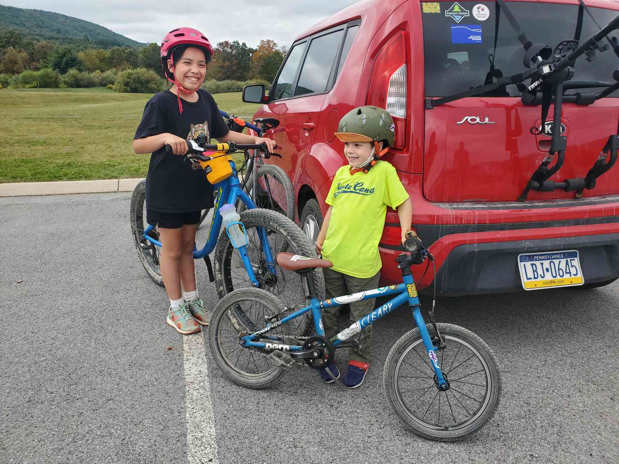 Smiling kids parking lot 1