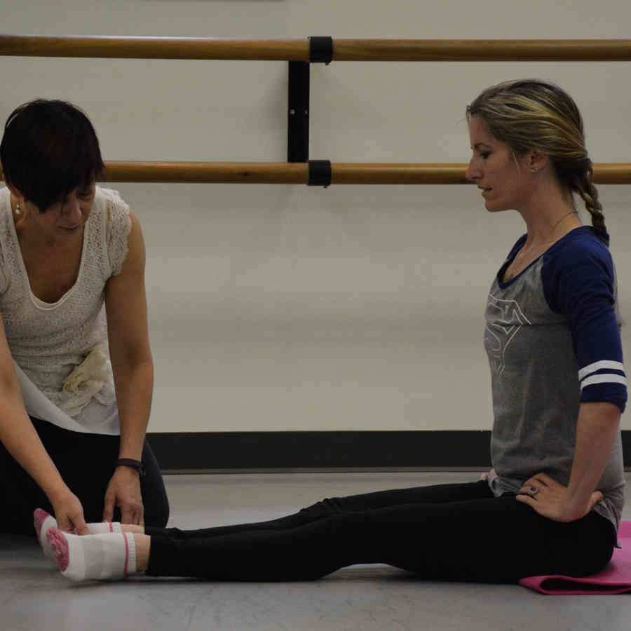 Ann Van Kuren teaching Mike Casper