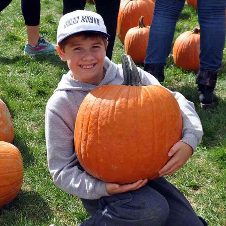 Boy with pumpkin_Arboretum